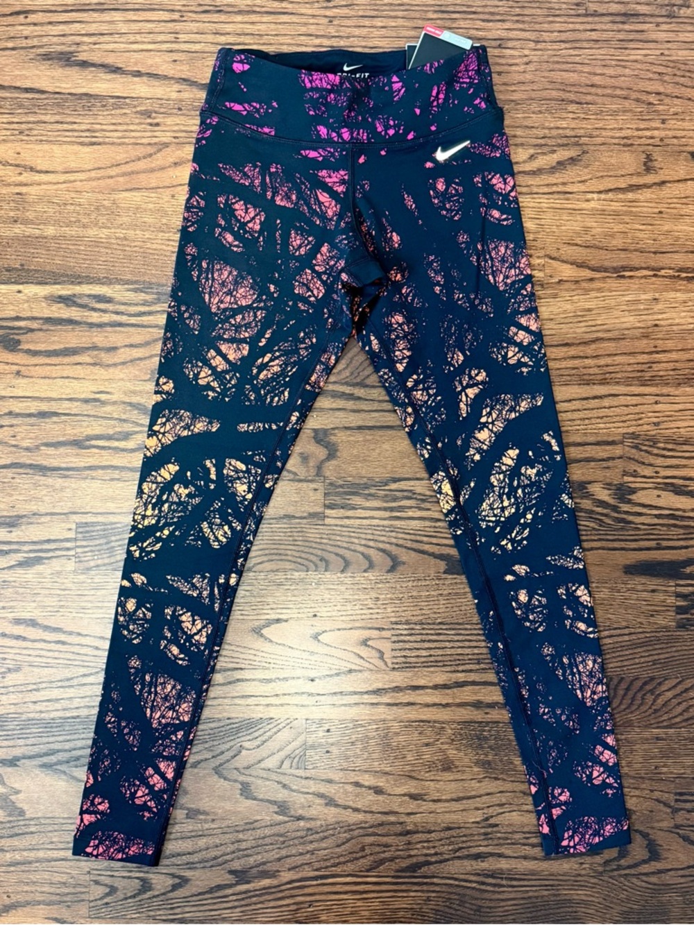 Nike Women’s Epic Lux Black Enchanted Forest Leggings in Pink and Orange